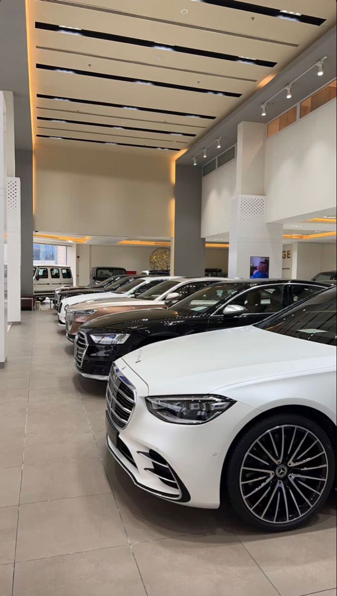 Image of a brand-new car parked at a showroom
Alt text: "A shiny new car displayed at a dealership in Tanzania, highlighting the appeal of purchasing new vehicles."

Image of a used car with a 'For Sale' sign
Alt text: "A used car for sale at a dealership in Tanzania, showcasing an affordable option for buyers."

Image comparing new and used cars side by side
Alt text: "A comparison of new and used cars parked next to each other, highlighting different options for buyers."

Image of a person signing paperwork at a car dealership
Alt text: "A customer signing documents to buy a new or used car at a dealership in Tanzania."

Image of a Japanese used car on a Tanzanian road
Alt text: "A Japanese used car driving on a road in Tanzania, demonstrating the popularity of imported cars."

Image of a mechanic inspecting a used car
Alt text: "A mechanic conducting an inspection on a used car, showing the importance of maintenance checks before buying."

Image of a family test driving a new car
Alt text: "A family test driving a new car in Tanzania, experiencing the latest technology and features."